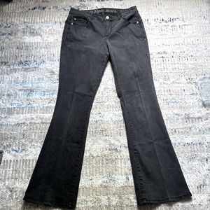 Calvin Klein black distressed, curvy boot cut jeans. GUC. size 10.